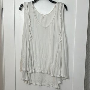 Free people creamy white ruffle tank. Size L.